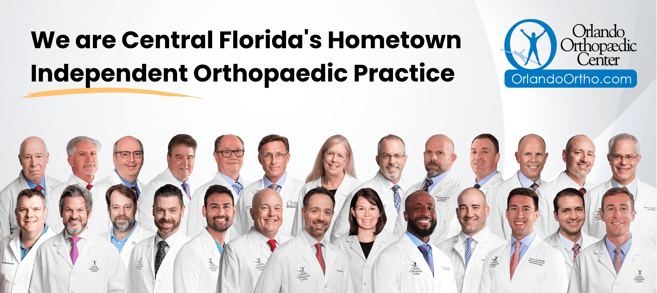 Orlando Orthopaedic Center 50 years photo with all current orthopaedic surgeons and physicians